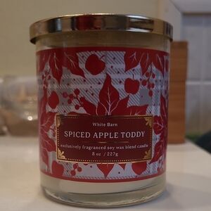 White Barn Spiced Apple Toddy Candle with Red and Gold Design
